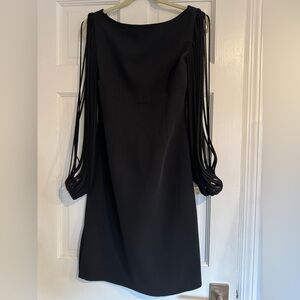BCBG unique cocktail dress black size 4 statement sleeves